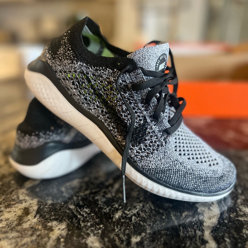 Black and White NIKE FLYKNIT Sneakers